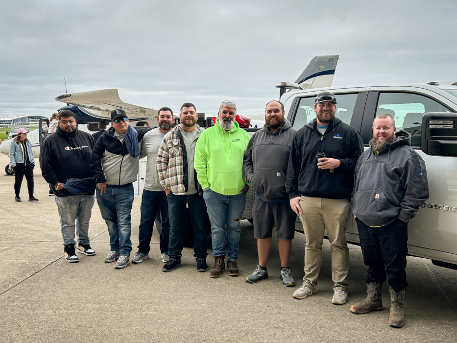 Team members stop for a picture