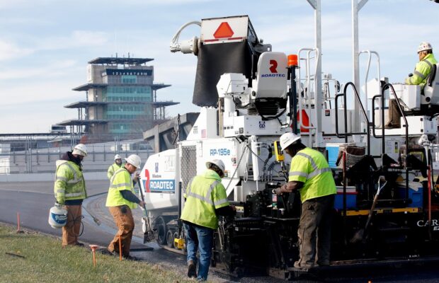 Milestone working on the IMS track with the pagoda in the background