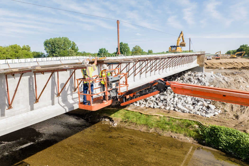 Milestone constructing a bridge