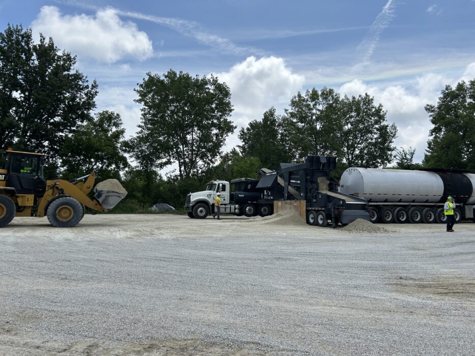 Stone going through the sieving machine and then loaded to be transported to the site