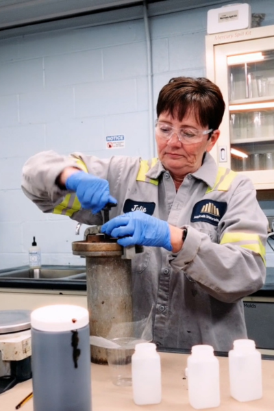 Female worker in a lab setting
